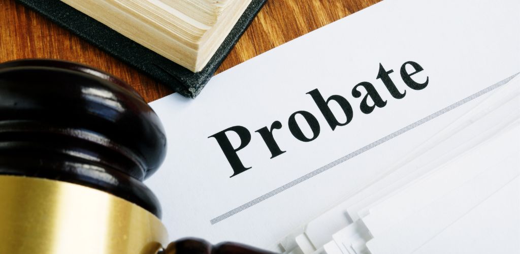 Probate written on paper with a judge's gavel and book nearby