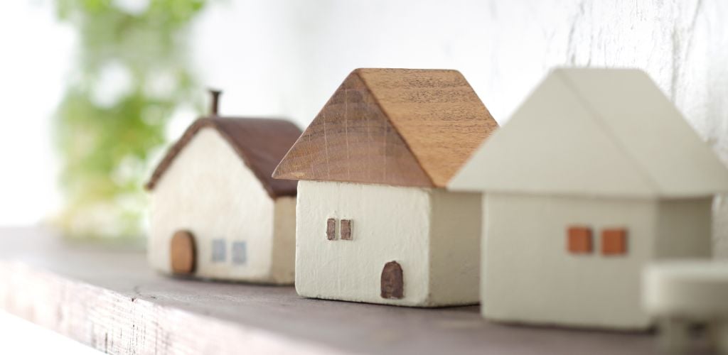 model houses on a shelf