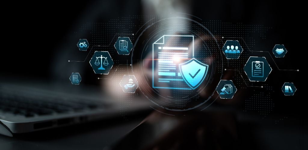 business person at computer with illustrated icons floating with a document most prominent