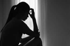 silhouette of woman in a room