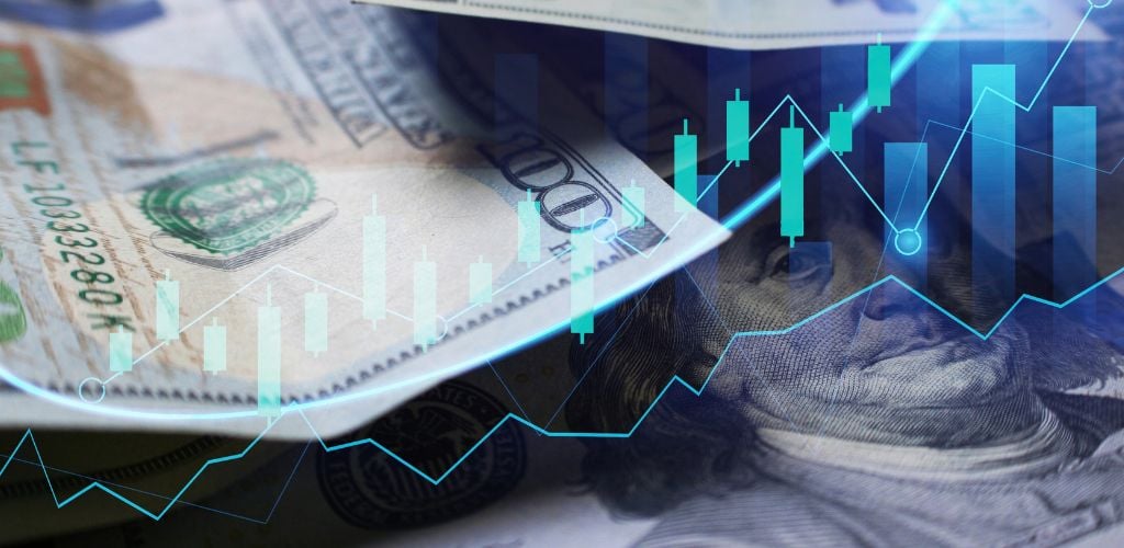 cash money and illustration showing increase in value